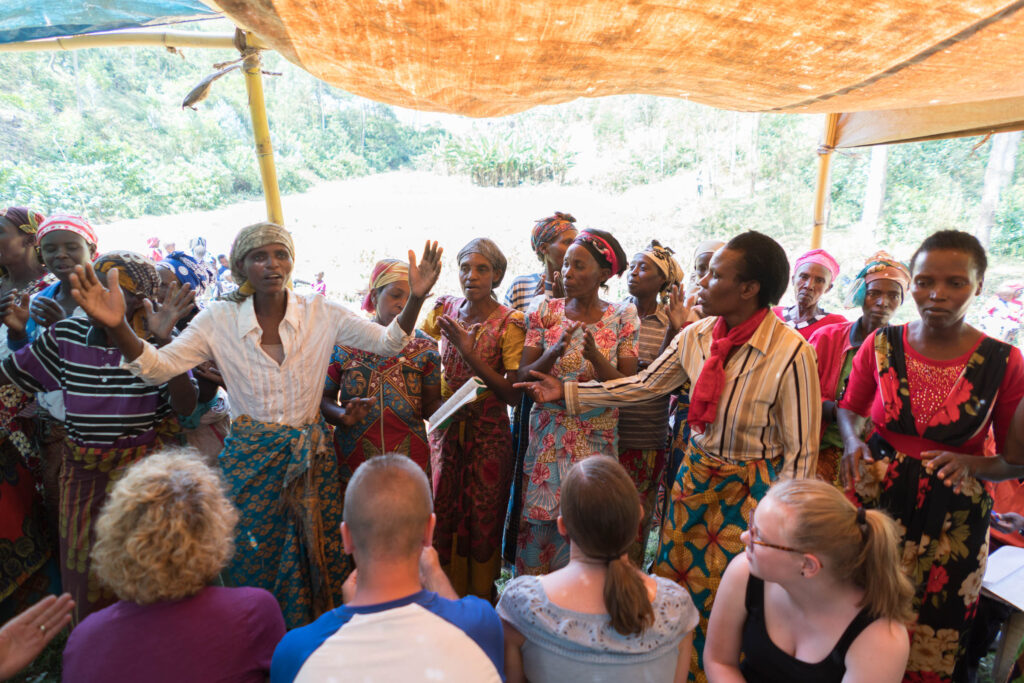 A group discussion under a shelter