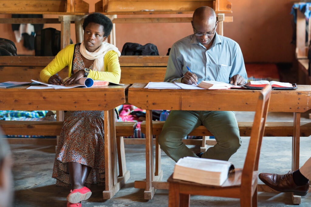 Two students working at a desk